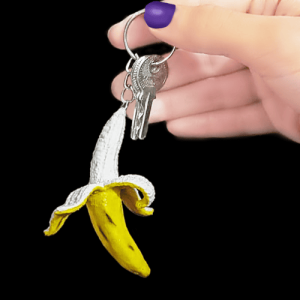 Handmade Banana Keychain by Creobiz, half-peeled clay banana charm